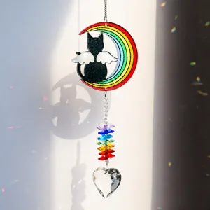 Detailed view of the acrylic black cat suncatcher with crystal prisms and rainbow light effect.