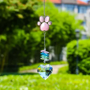 Crystal suncatcher wind chime with pink paw print and crystal heart pendant for garden.