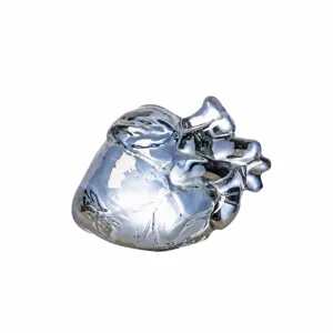 Silver chrome anatomical heart sculpture, modern luxury desktop decor and unique romantic gift.