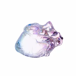 Detail view of the iridescent crystal anatomical heart ornament, showcasing aurora glass texture.