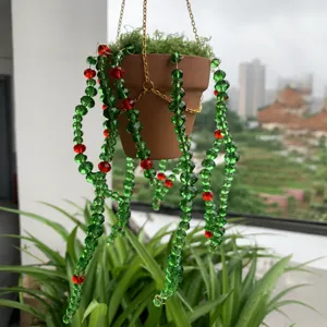 Handmade crystal beaded hanging potted plant ornament for garden decor and window suncatcher.
