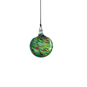 Handcrafted blown glass suncatcher ball for Christmas tree and garden decoration hanging.