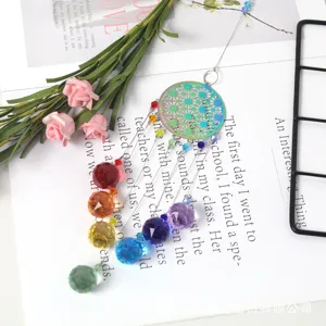 Crystal suncatcher wind chime pendant with colorful faceted balls and metal geometric top piece.