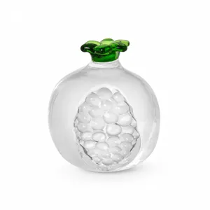 Transparent crystal glass pomegranate fruit ornament, modern home decor desktop craft display.