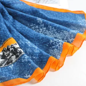 Élégante foulard bleu imprimé avec bordure orange vif style luxe châle pour femme