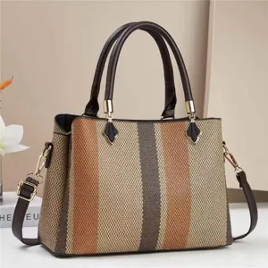 Sac à main bandoulière pour femme rayé color block tendance avec poignées robustes.
