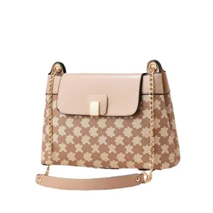 Bolso de hombro de cuero PU de moda con lona estampada y correa de cadena de metal para mujer.