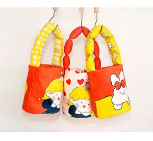 Cute plush bucket handbag with padded handle, stylish and soft fabric cartoon printed daily bag.