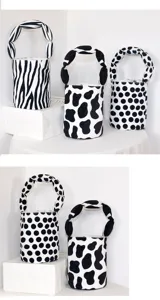Canvas handbag small bucket bag with cow print and polka dots, versatile stylish tote.