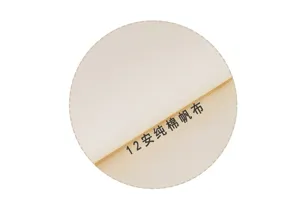 Detailed view of 12oz pure cotton canvas fabric swatch, showing natural texture for custom bags.