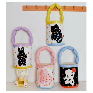 Detailed view of cute polka dot cat print flannel handbags, hanging storage organizer bags.