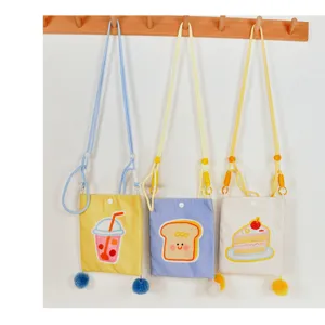 Bonito bolso de lona para teléfono con pompón, pequeño bolso para niños y niñas con diseño dulce.