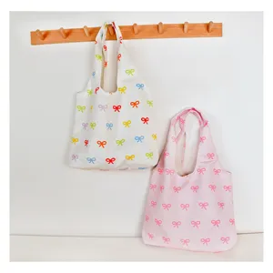 Cute bow print canvas tote bag, Korean style large capacity casual single shoulder daily bag.