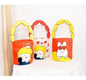 Cute canvas bucket bag with puffy handle and cartoon print, sweet style casual handbag for women.