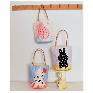 Cute cartoon cat and rabbit print canvas tote bag, perfect for daily use and gifts.