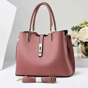 Stylish women's pebbled leather handbag with top handles and detachable strap for daily use.