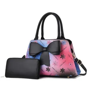 Vista detallada del juego de bolso degradado para mujer con lazo negro elegante.