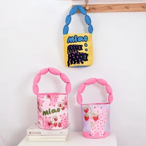 Cute cartoon padded strap bucket bag, sweet strawberry cat print canvas handbag for daily use.
