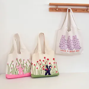 Cute polka dot cat canvas tote bag, large capacity shoulder bag for women daily casual use.
