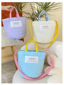 Quilted tote bag with contrasting handle and heart pattern, casual daily crossbody bag.
