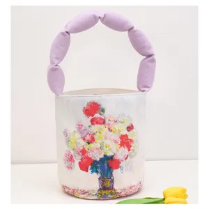 Retro oil painting canvas bucket bag with purple puffed padded handle for women daily outing.
