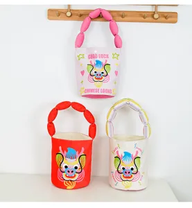 Detail shot of cartoon Loong bucket bag with padded handle, festive design for daily wear.