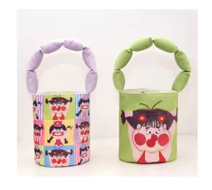 Cute cartoon print canvas bucket bag for women, stylish round cylinder handbag with puff handle.