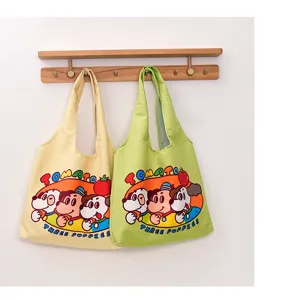 Canvas tote bag with cute cartoon dog print, large capacity casual shoulder bag for students.