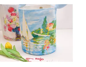 Retro oil painting bucket bag with padded straps, elegant canvas handbag for women.