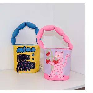Cute cartoon canvas bucket bag with padded handle, niche design cute handbag for women and kids.