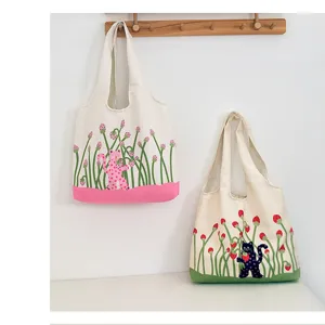Cute polka dot cat print canvas tote bag, large capacity shoulder bag for daily casual use.