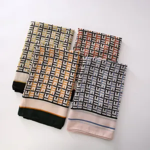 Detailed view of fashionable geometric patterned scarves in multiple color options for women.