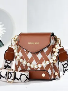 Fashion brown and white plaid shoulder bag with pearl handle and wide strap for women.