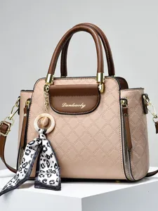 Elegante gesteppte Damen Handtasche mit Henkel und schickem Schal Anhänger für Alltag.