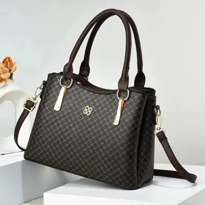 Bolso de mano vintage marron para mujer con patron, asas dobles y correa para otono invierno.