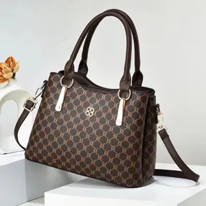 Elegante bolso de mano marrón para mujer con asa y correa de hombro para otoño e invierno.