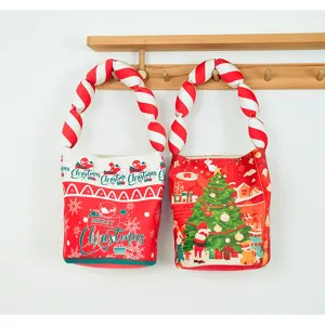 Christmas bucket bag with padded candy cane straps, festive red gift candy bag for children.