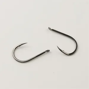 Carbon steel Chinu fishing hooks detail view, barbed design for saltwater and freshwater.