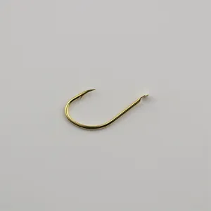 Gold barbed fishing hook detail shot, sharp point and flat eye for smooth lake fishing.