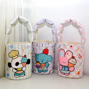 Cute cartoon canvas bucket bag with puffy handles, colorful animal prints, perfect for kids use.