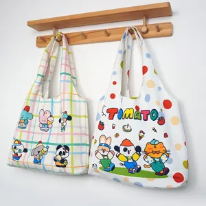Canvas tote bag for women, cute cartoon print casual shoulder bag, large capacity daily use.