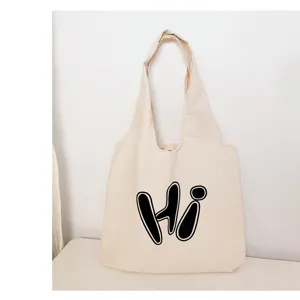 Minimalist casual canvas tote bag detail view, featuring stylish black letter print for daily use.