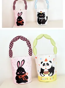 Canvas bucket bag with cute cartoon prints, padded bubble handles, ideal for casual daily use.