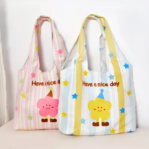 Casual canvas tote bag with cute stripe and flower pattern, ideal daily shoulder bag.
