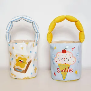 Cute canvas bucket bag with cute cartoon prints and puffed handles for casual daily use