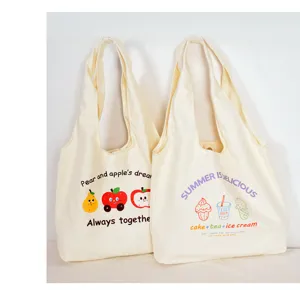 Beige canvas tote bag for women, large capacity casual shoulder bag with cute cartoon prints.