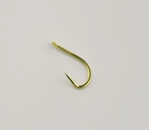 Close-up detail of a sharp golden barbed fishing hook, professional tackle design.