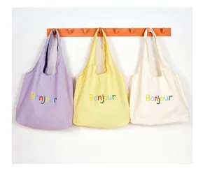 Grand sac cabas en toile style coreen sac d'epaule tendance pour les loisirs quotidiens.