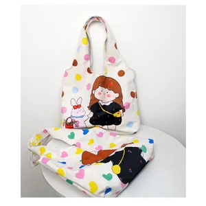 Casual canvas tote bag for women, cute cartoon girl and rabbit print, large capacity daily shoulder bag.