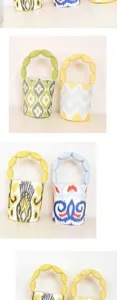 Detailed view of canvas bucket bags with unique bubble handles and ethnic ikat patterns.